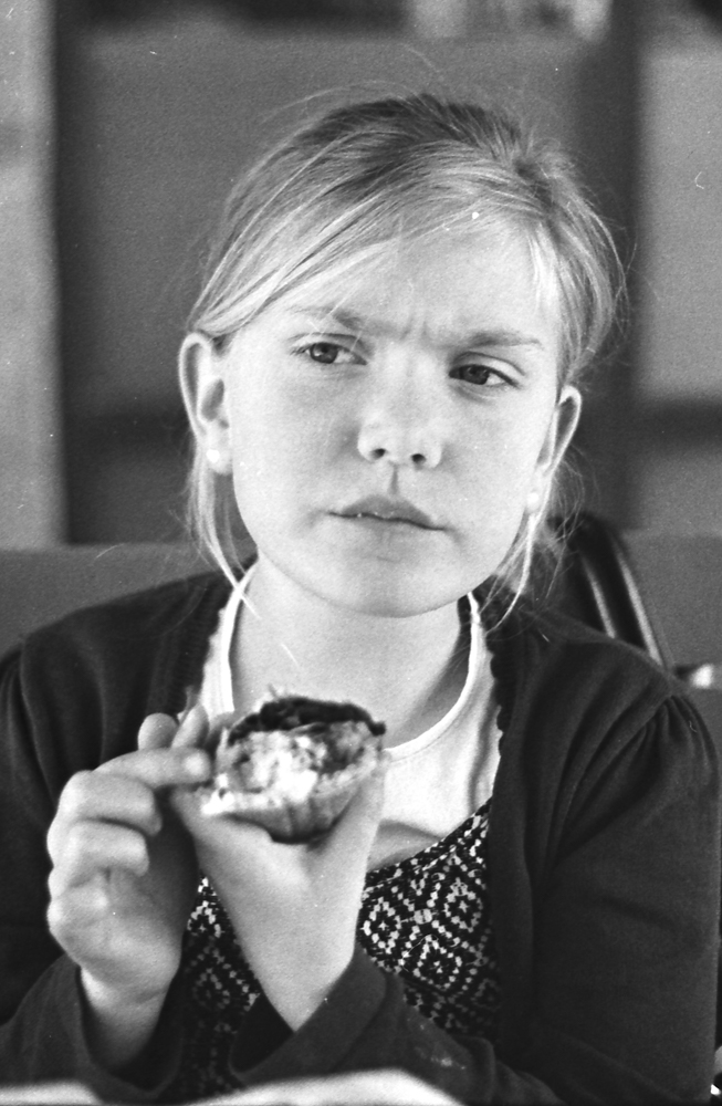 my daughter contemplating cake